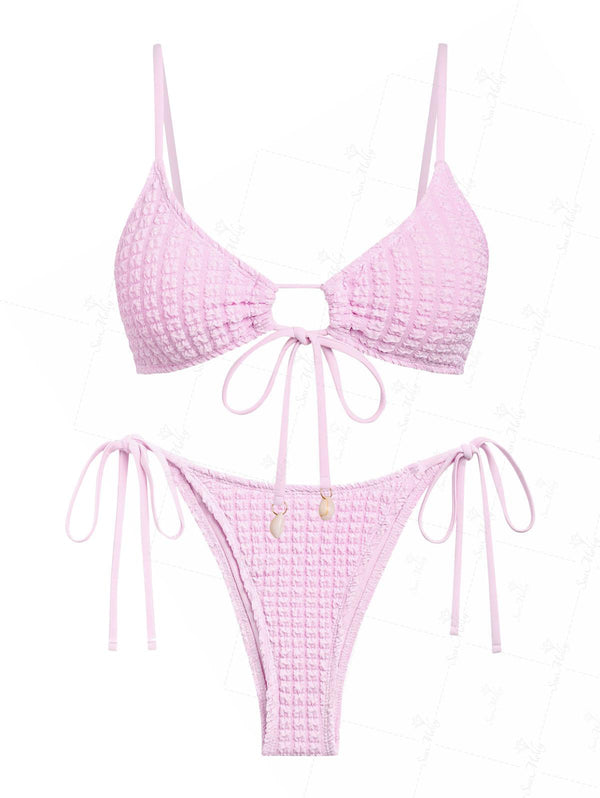 Enea | Conjunto de bikini de color liso con diseño de conchas