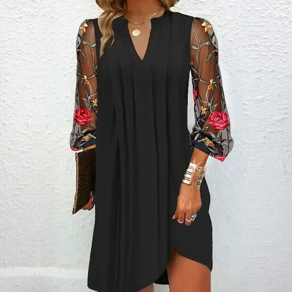 Antonia | Elegante minivestido con escote en V y mangas transparentes