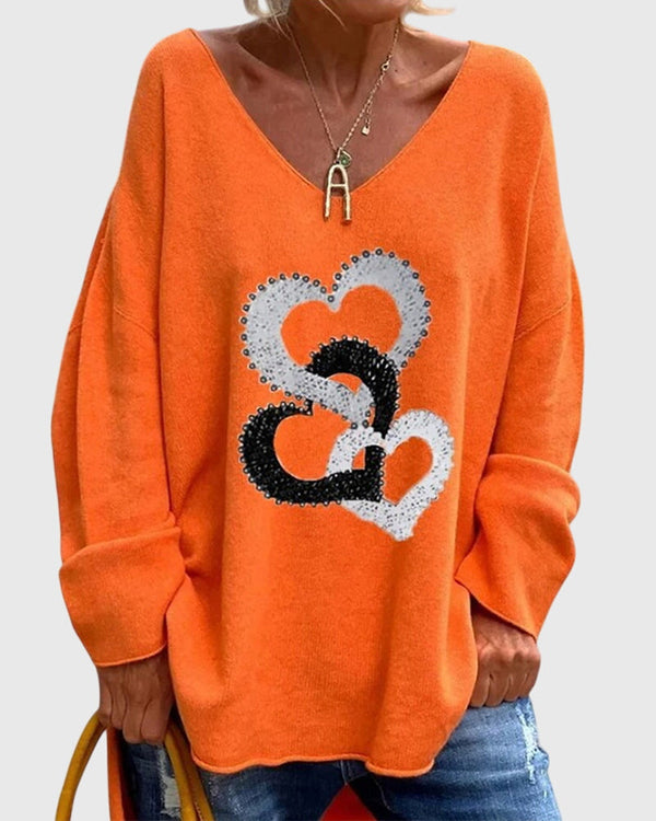 Tonia | Camisa con cuello en V y estampado de corazones